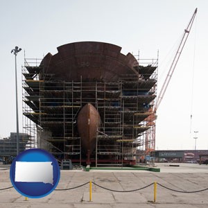 a ship building project at a Polish shipyard - with South Dakota icon